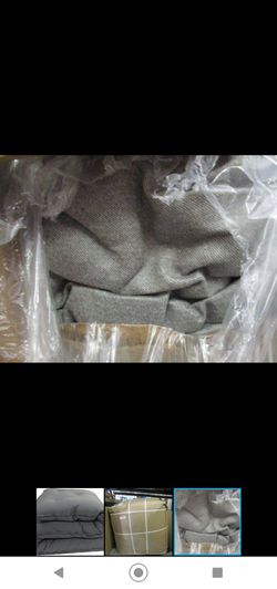 Gray futon NEW IN THE BOX MAKE ME AN OFFER