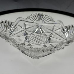 (1) American Brilliant oval candy dish. Crystal cut glass. Has a chip on it hardly noticeable. As-is. See pics.