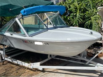 14’ fiberglass boat in great working order pink slip boat/trailer Outboard 9.9 serviced