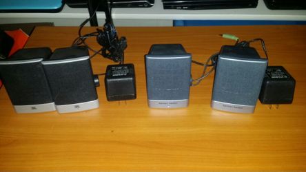 Computer speakers amplified with cords and power supply a/c adapters