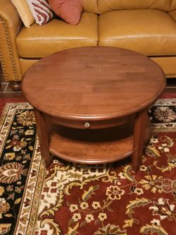 Round Wood Coffee Table with Shelf and Drawer