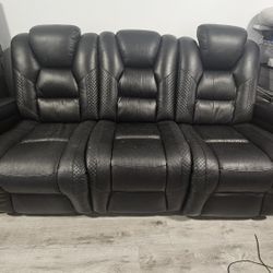 Black vinyl leather couch and recliner