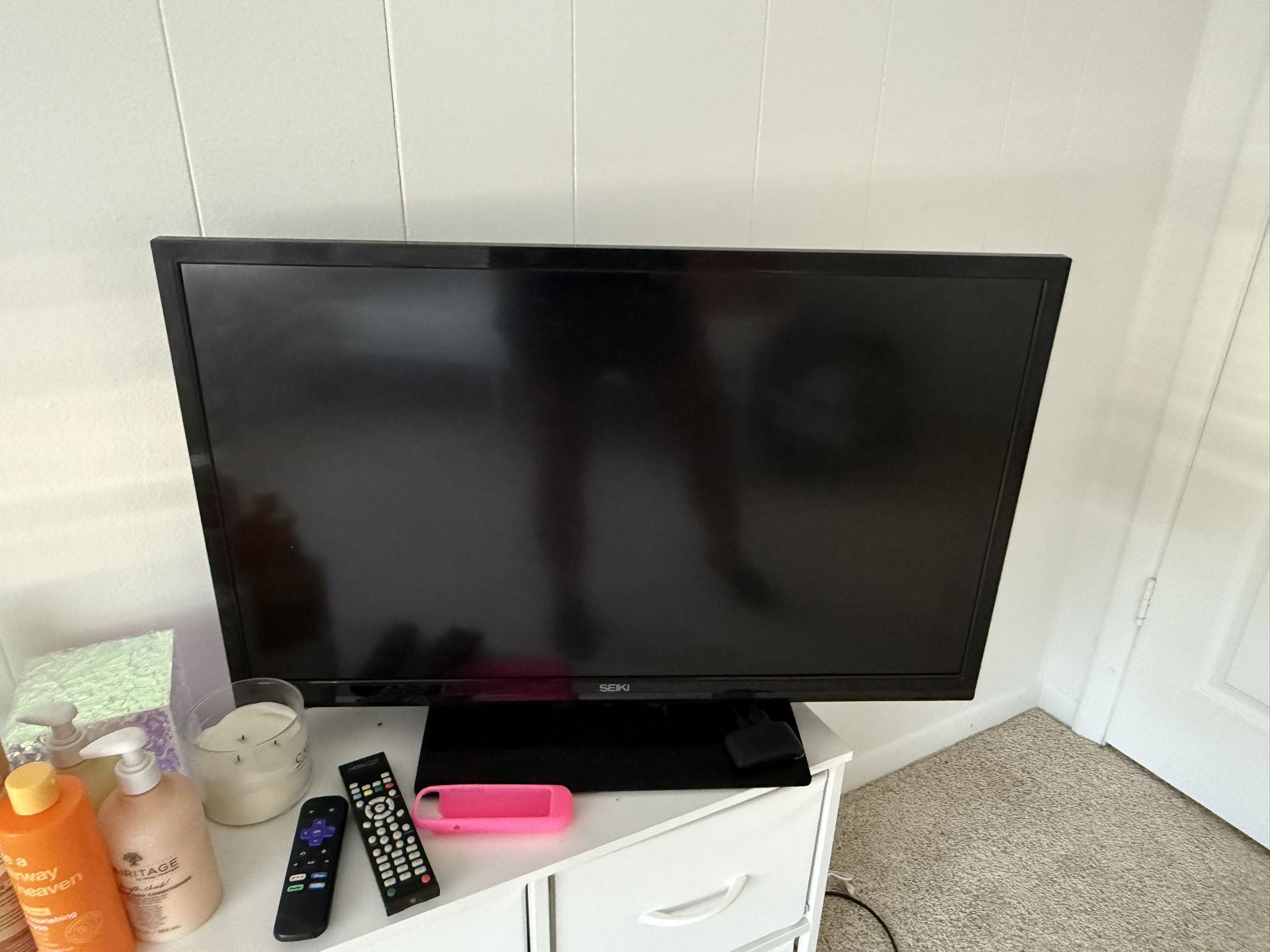 TV with Roku Box And Remotes