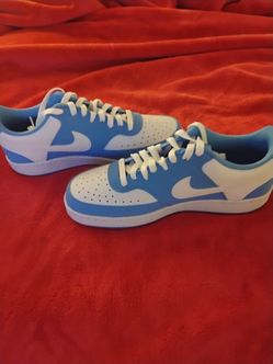 Blue Nike shoes size 8