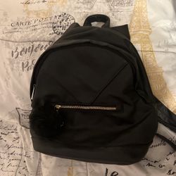 Backpack With Teeth In Zipper