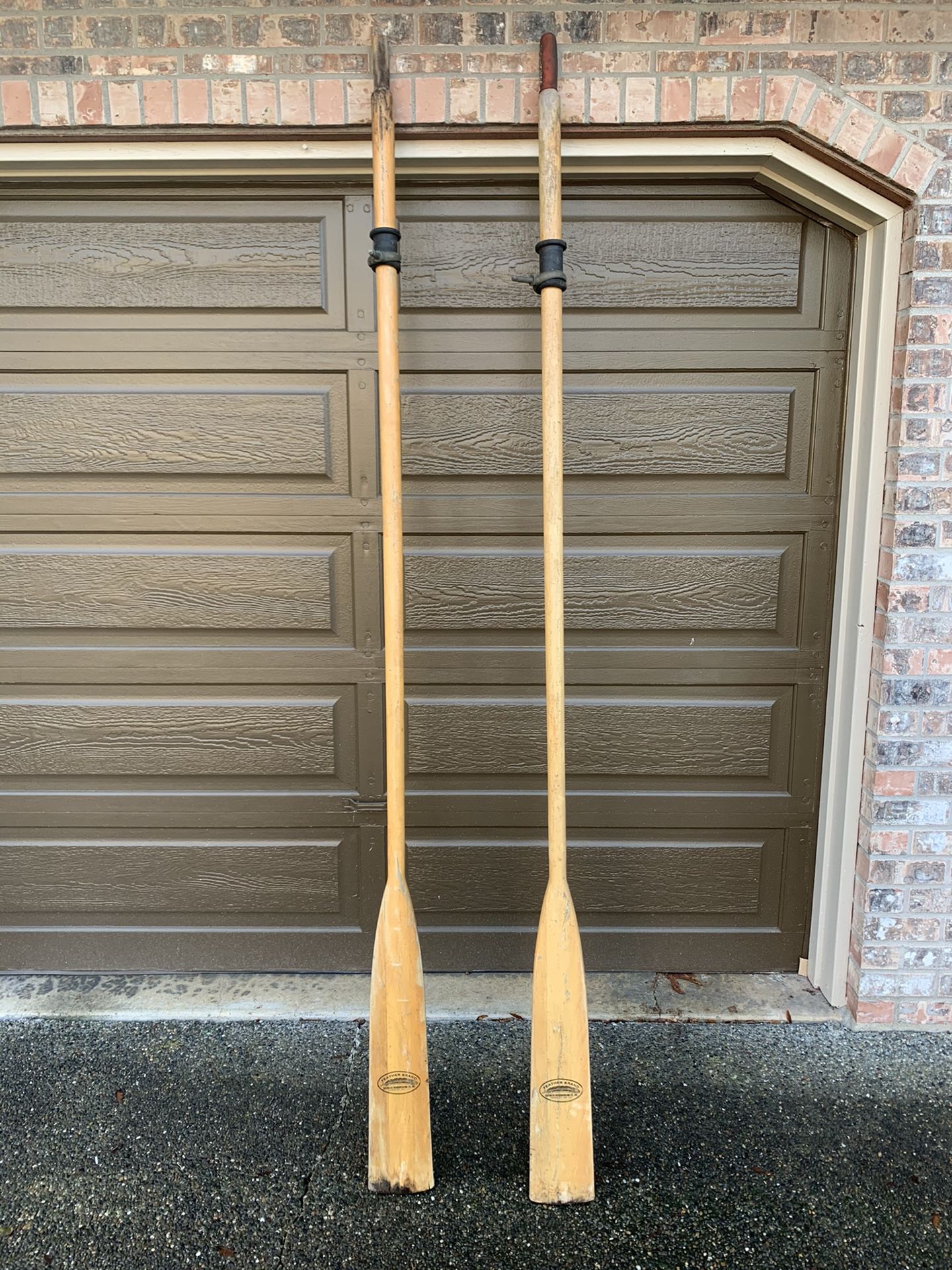 8 foot Caviness Feather Brand oars with oar locks