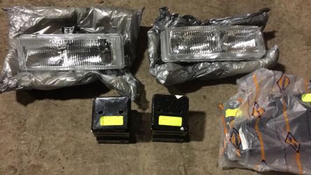 Van headlights and front bumper brackets