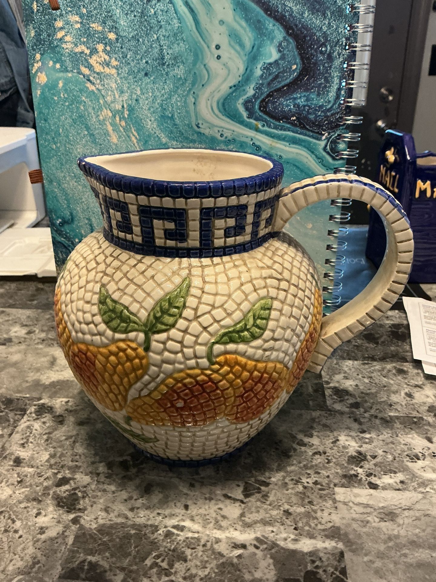 This is a vintage Clay Art San Francisco Mosaic Pear ceramic pitcher. 
