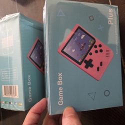 Pink And Green Game Boxes With 500 Games On Them