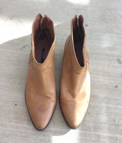 Pair Of Brown Leather Boots