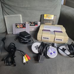SNES super Nintendo console with 2 controller and Over 100 Games