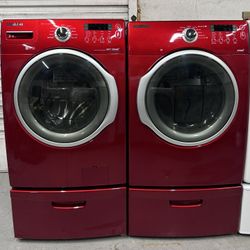 Red Samsung Washer and Dryer Set with Pedestals