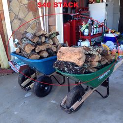 Firewood sold by the wheelbarrow.