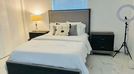 Queen bed + 2 matching nightstands for sale.