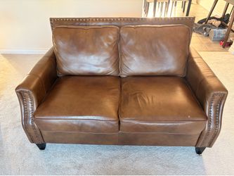 Leather couch with silver beading