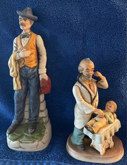 2 Doctor figurines