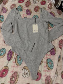 New M bodysuit