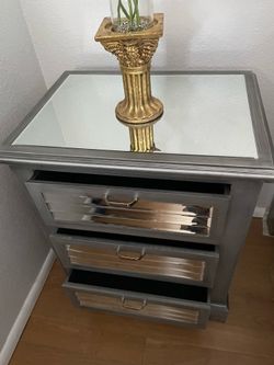 Mirrored silver 3 drawers new - 22.5 inches wide/  16.5 inches deep/. 27 inches high