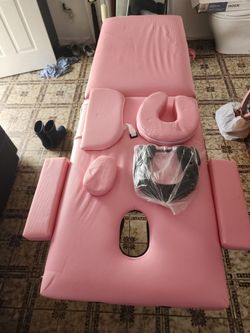 Cama rosada de masaje o cejas