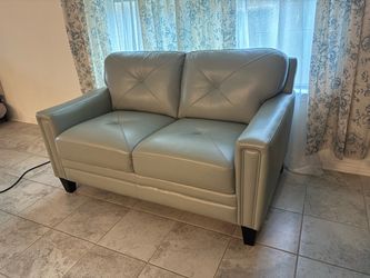 Individually: $350 sofa and $250 matching love seat
