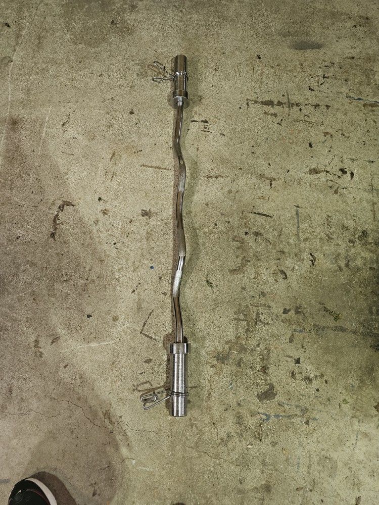 Solid Olympic 2" curl bar with collars