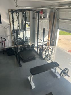 whole bunch of gym equipment