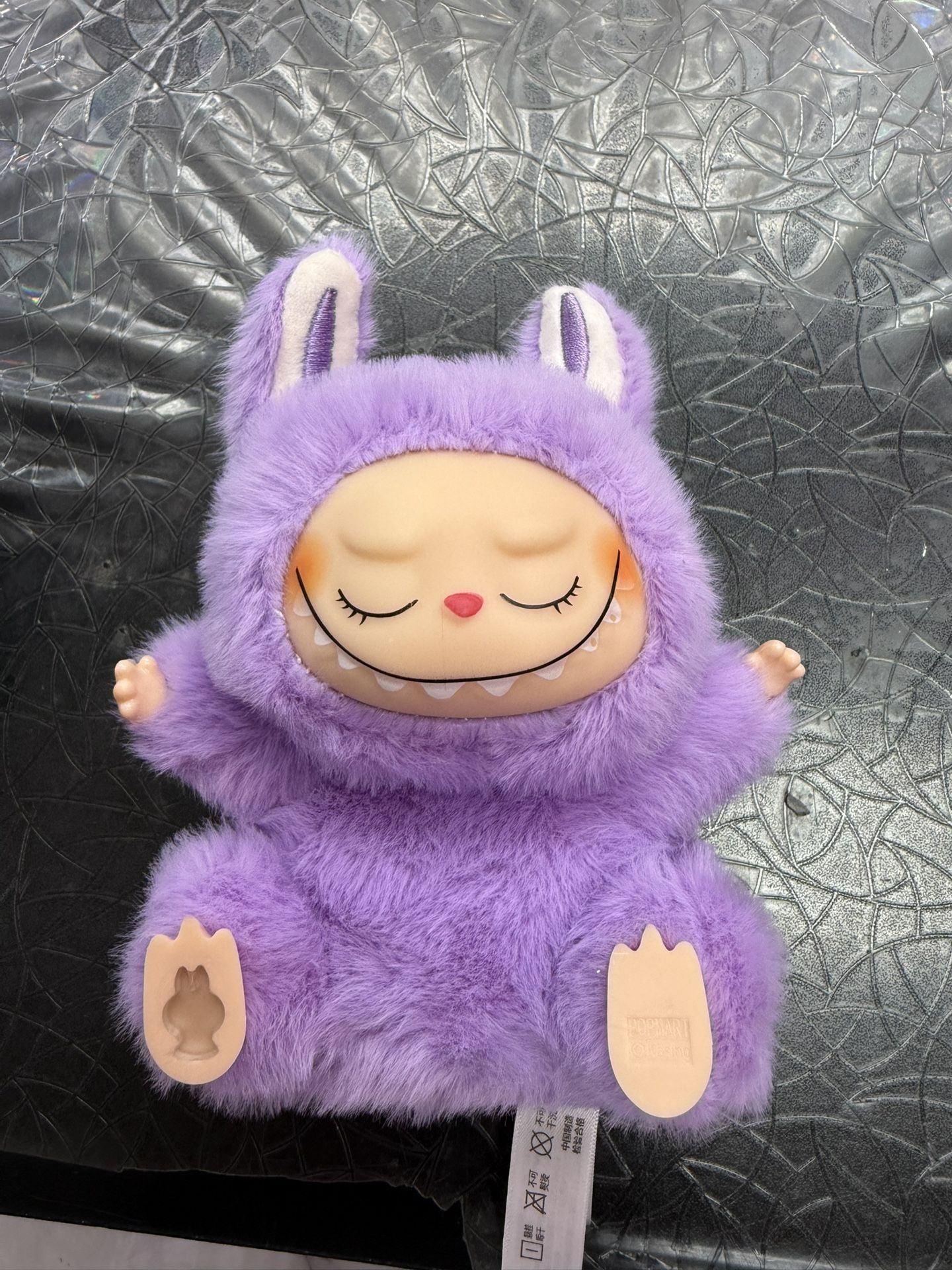 Purple Labubu $10