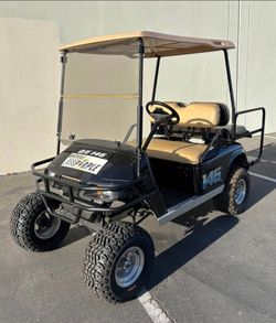 2002 E-Z-GO TXT PDS 4-Passenger Lifted 36-Volt Golf Cart