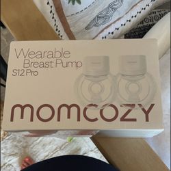 Mom cozy breast pump brand new never been taken out of the box