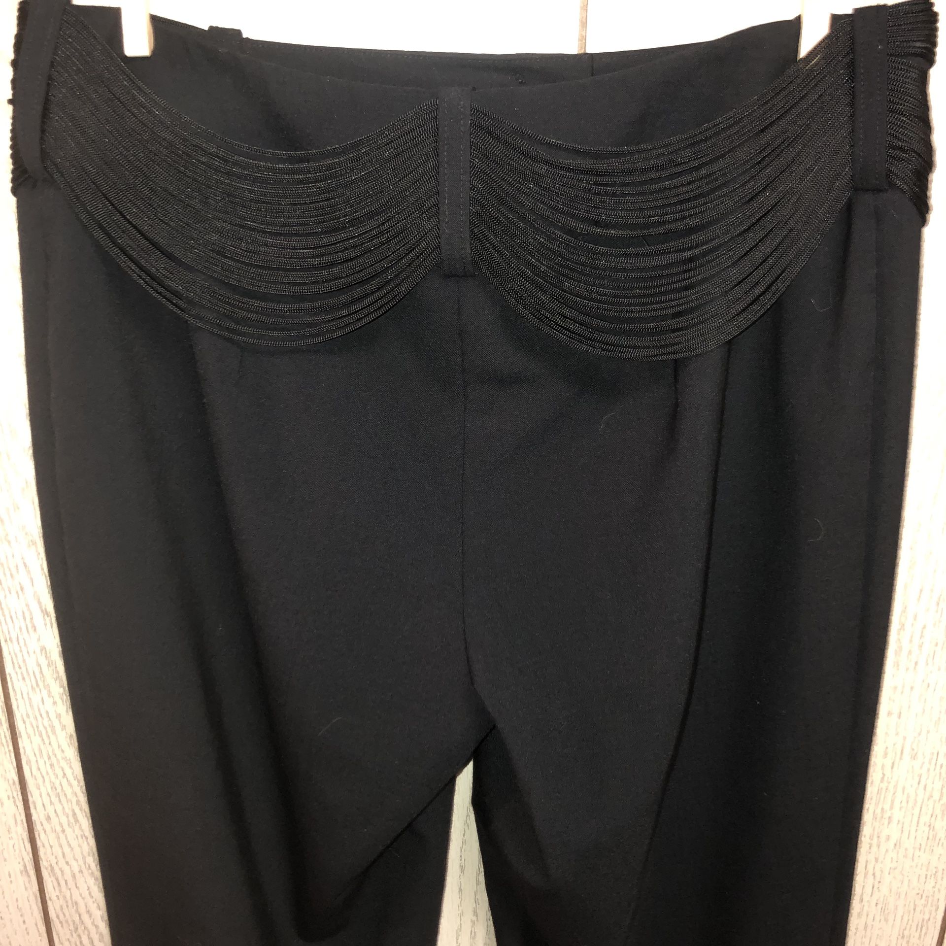 INC stretch international concepts black slacks/dress pants with lots of strings that go all the way around the waist and sort of look like a belt gi