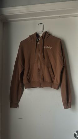 Juniors tan graphic zip up hoodie size M,