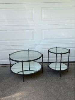 Matching Pair: Large Round Glass Top Coffee Table with Mirrored Lower Shelf + Smaller Side Table, Dark Metal Frame