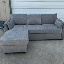 FABRIC SLEEPER SOFA WITH REVERSIBLE CHAISE 