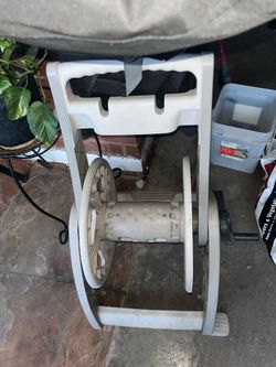 White and Grey Reel Hose Tool Purchased from Home Depot