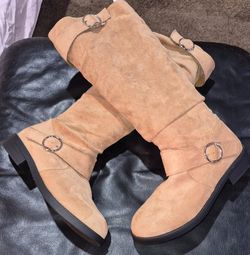 Tan faux suede boots size 9 never warn.