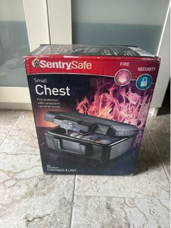 New never used SentrySafe Fireproof Money Safe with Key Lock, Black Lock Box with Portable Carrying