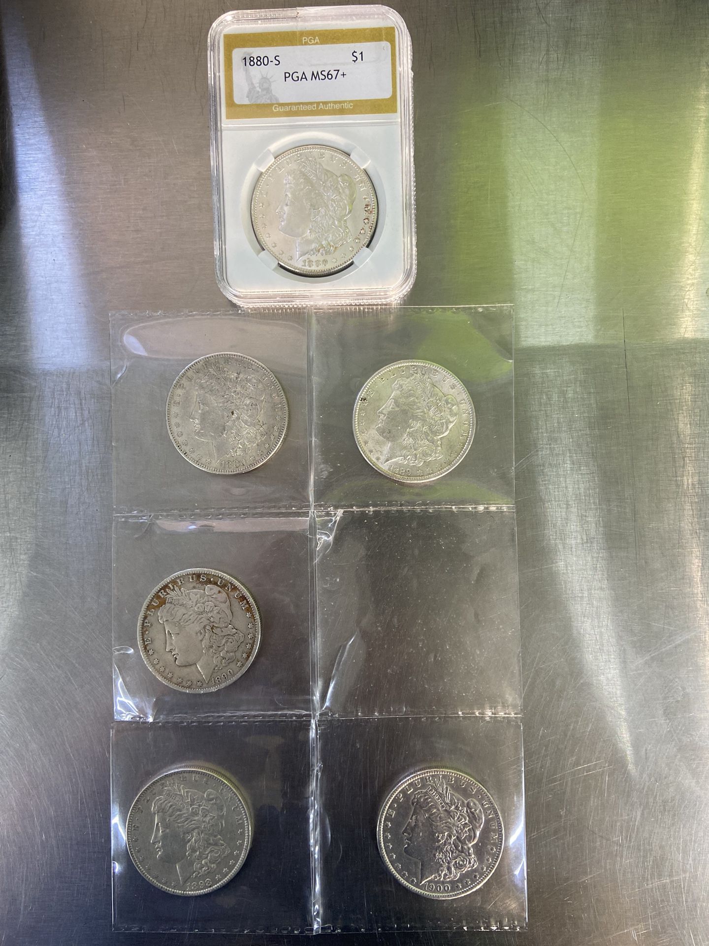 6 Morgan Dollars 1 Certified MS67+ for PGA And 5 Not Certified $1000 OBO