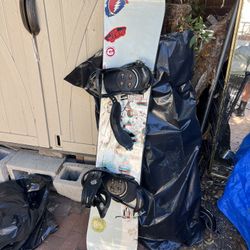 Ride Brand Snowboard (H60inxW12in) with Burton Cartel Bindings (rust damage) and Lavar Board Bag