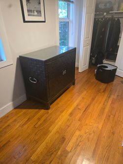 Large brown leather designer cabinet with custom glass top