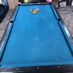 vintage pool table from Quality Billiards Mfg. Co.