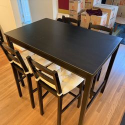 Table And Four Chairs