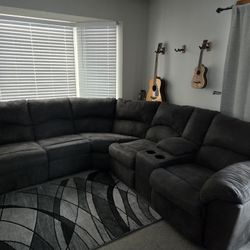 Ashley Tambo 2-Piece Manual Reclining Curved Sectional in Gray