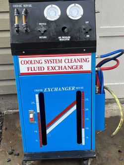 Rhino cooling system cleaning fluid exchanger