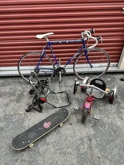 Bike Skate Board And Tricycle And Bike Rack