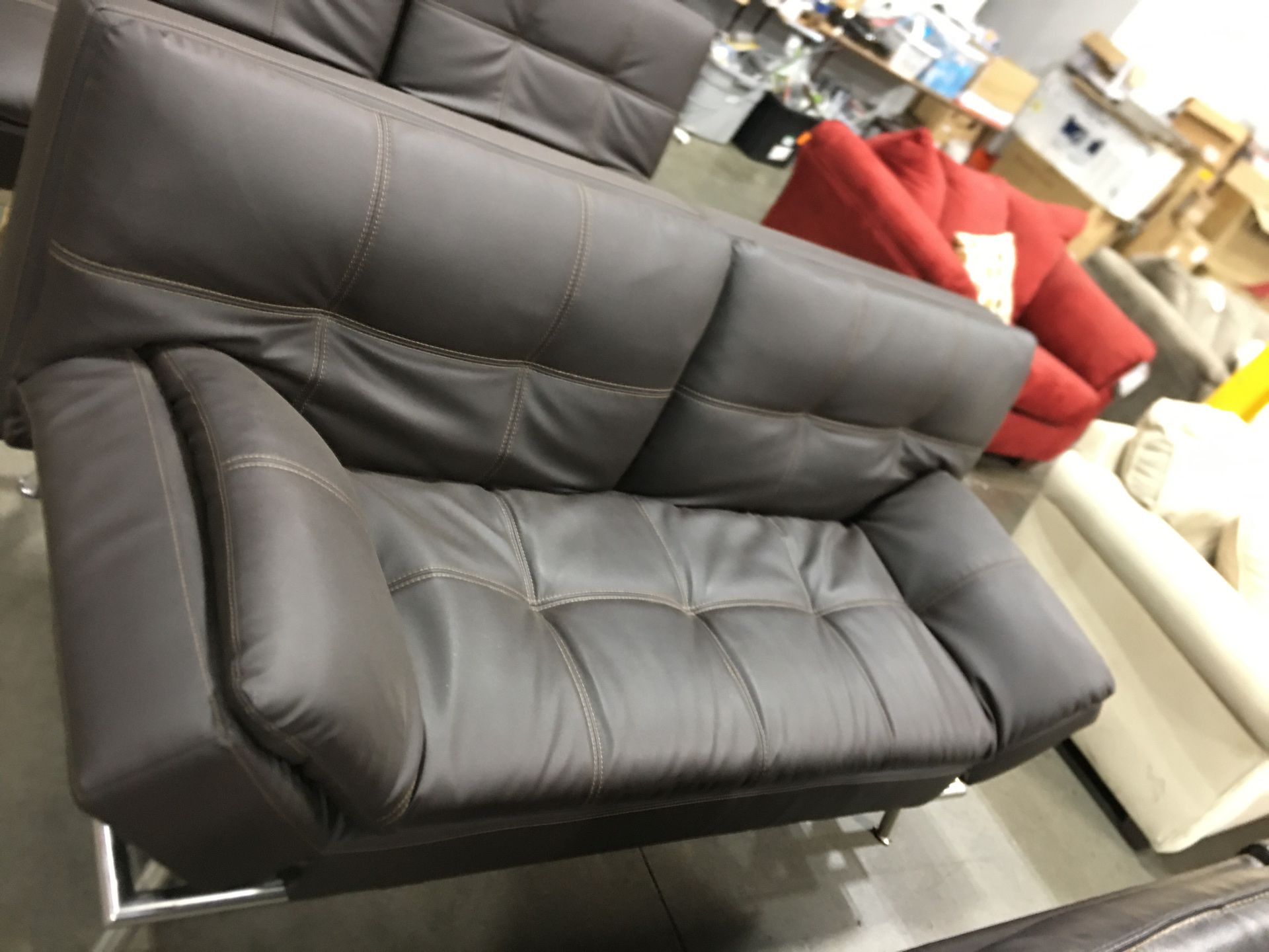 Leather futon in brown