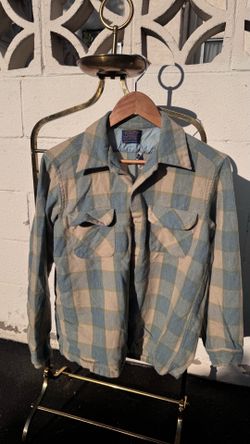 vintage Pendleton wool flannel shirt featuring a blue and beige plaid pattern