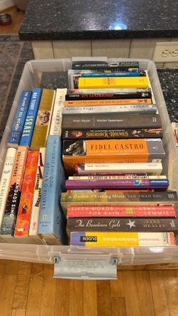 Hundreds of books for $1 each.  Must be local in Durham, NC.