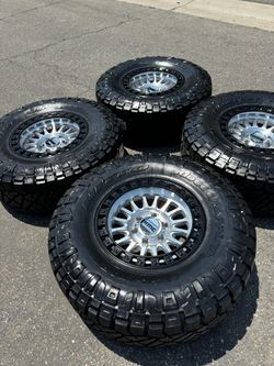 KMC KM552 IMS 6x5.5 Wheels with 35” Nitto Ridge Grappler Tires Machined with Black rings and Chrome Caps