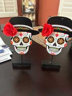 Dia de Los Muertos signs and candles