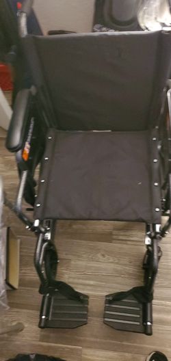 New Wheelchair With Foot Rests And New Cushions.  200 Or Best Reasonable Offer.